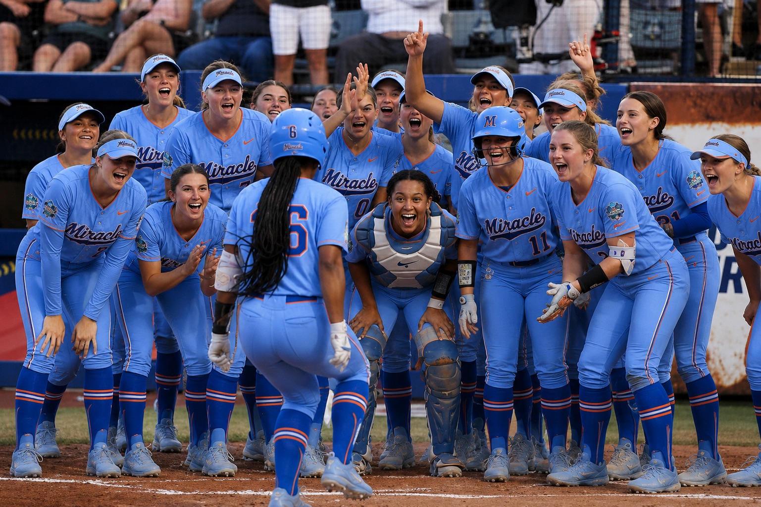 Knoxville Miracle softball players celebrating at home plate